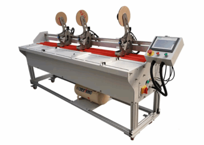 Stroj na aplikaci oboustranné lepící pásky TMS 2200